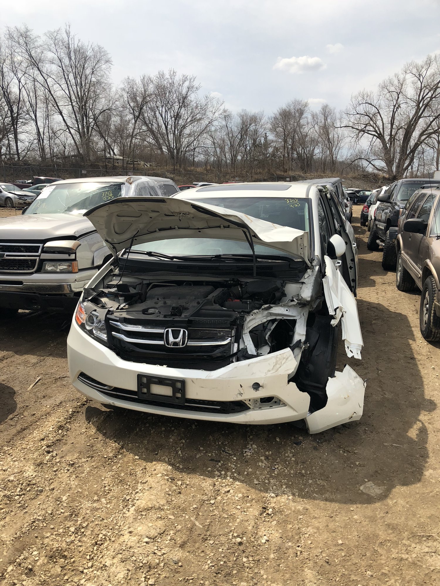 2015 Honda Odyssey EX-L — Before repair, April 24, 2018 — front passenger-side damage